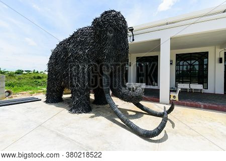Nakhonpathom , Thailand -  6  August, 2020 : Big Mammoth Model Recycle Made From Old Car Tire In  Ca
