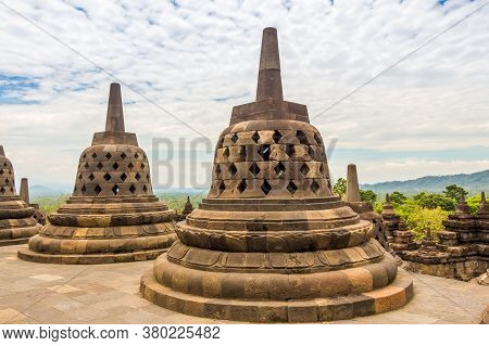 Borobudur, Indonesia - October 15th 2016: Stupas That Look Like Bells On Top Of The Borobudur Buddhi