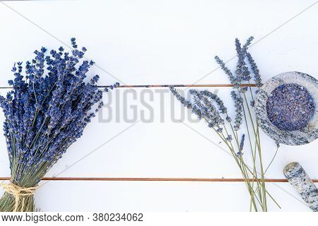 Bouquet Of Blue Avender Flowers On White Wooden Board