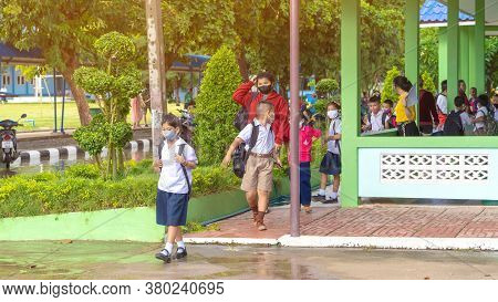 Kanchanaburi,thailand-july 2,2020:thai Students Wear Various Medical Masks To Prevent Themselves Fro