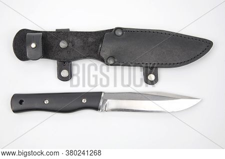 Knife For Camping And Hunting In A Leather Case On A White Background.  Cutting Tool. Isolated Objec