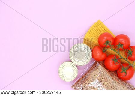 Food Supply. Crisis Stocks For The Period Of Quarantine Isolation On A Pink Background. Spaghetti, B