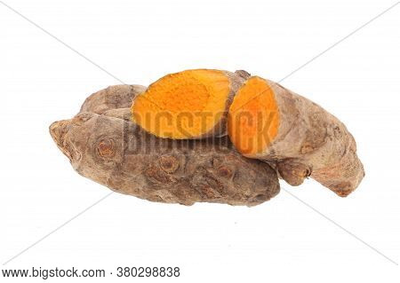 Turmeric Powder And Turmeric Isolated On White Background.
