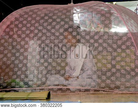 Wat Sam Phran Temple, Nakhon Pathom, Thailand, November 16, 2015: A Buddhist Nun Meditating Inside A