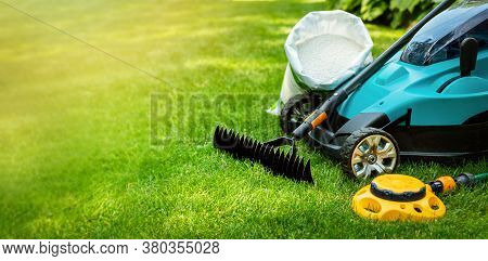 Garden Lawn Care Tools And Equipment For Perfect Green Grass. Banner Copy Space
