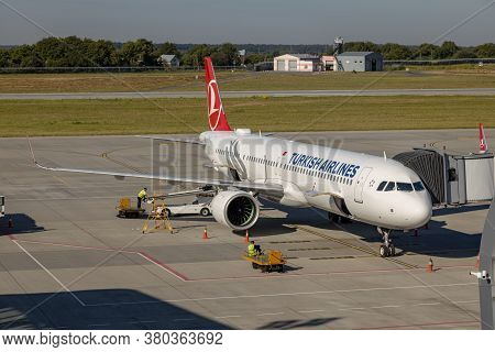 Lviv, Ukraine - 09 Aug 2020: Turkish Airlines Passenger Plane Unloads Baggage At The Lviv Lwo Danylo