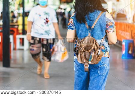 Mini Portable Alcohol Gel Bottle To Kill Corona Virus(covid-19) Hang On A Leather Shoulder Bag Of A 