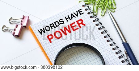 Notepad With Text Words Have Power On White Background With Clips, Pen And Magnifying Glass