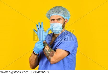 Experienced Doctor. Doctor Surgeon Wear Rubber Glove. Nurse In Respirator Mask. Medical Worker Ready