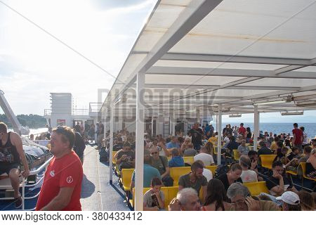 Supetar Croatia, August 2020 Car Ferry Connecting Supetar And Split Full With Passengers And Tourist