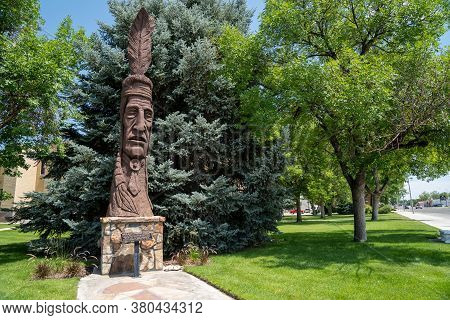 Worland, Wyoming - July 25, 2020: Trail Of The Whispering Giants Totem Statue, By Artist Peter Wolf.