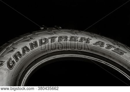 Krasnoyarsk, Russia, August 12, 2020: Dunlop Grandtrek At 5 Tires-inscription On The Sidewall Of The