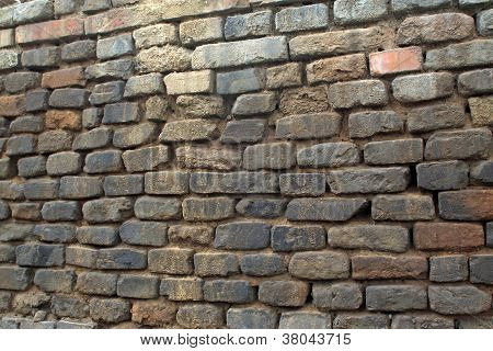 Grijze bakstenen muur op het platteland van China