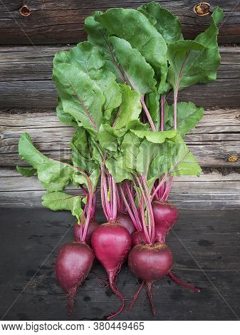 Young Fresh Beets On A Wooden Background.