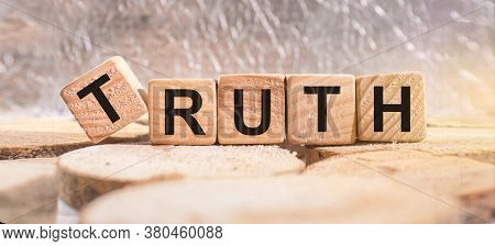 Wooden Blocks With The Word Truth. Business And Finance Concept.