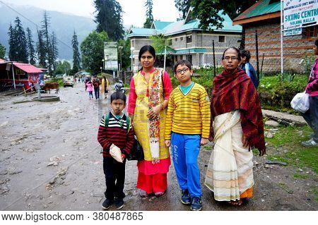 Manali, Himachal Pradesh, India, 27 June 2017: Two Indian Boys With Their Mother And Granny Standing