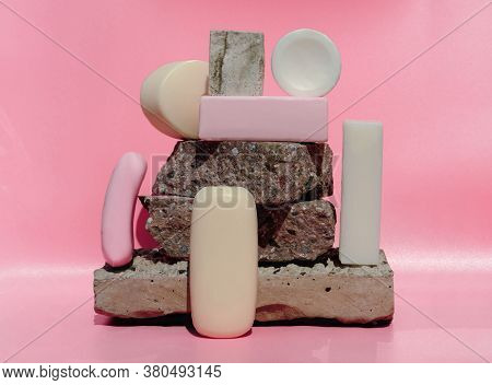 Different Types Of Soap Bars. Trendy Style. Organic Soap Bars On A Pink Backgrpond. Stone Pedestal. 