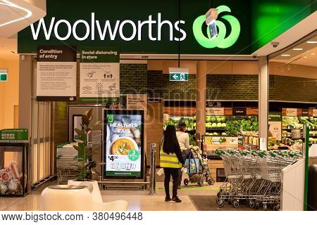 Sydney, Australia 2020-08 Entrance To Woolworths Supermarket With Social Distancing Banners During T