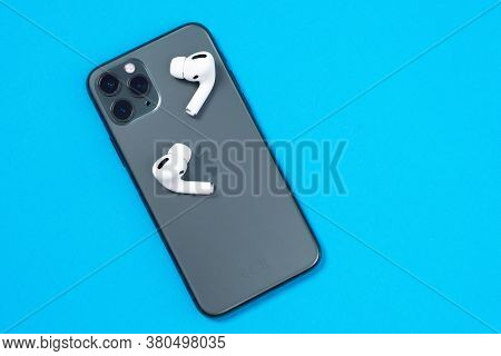 Rostov, Russia - July 06, 2020: Smartphone Apple Iphone 11 Pro Of Midnight Green Color And Wireless 