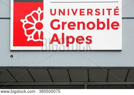 Grenoble, France - June 15, 2019: Grenoble University Building And Symbol On A Wall. The University 