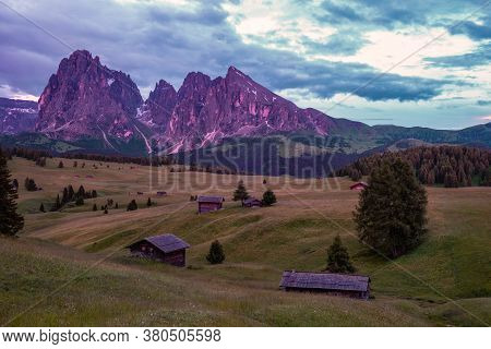 Alpe Di Siusi - Seiser Alm With Sassolungo - Langkofel Mountain Group In Background At Sunset. Yello