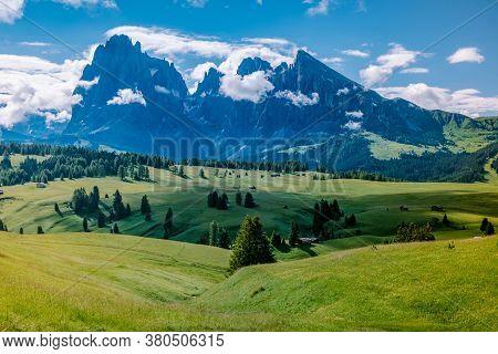 Alpe Di Siusi - Seiser Alm With Sassolungo - Langkofel Mountain Group In Background At Sunset. Yello
