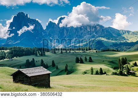 Alpe Di Siusi - Seiser Alm With Sassolungo - Langkofel Mountain Group In Background At Sunset. Yello