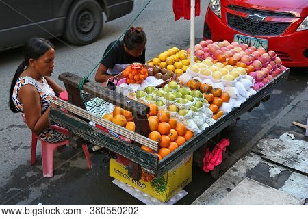 Manila, Philippines - November 25, 2017: Vendors Sell Fruit In Binondo District In Manila, Philippin