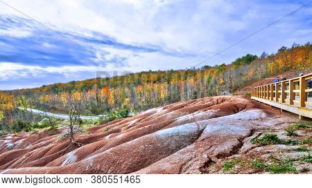 View From The Boardwalk - The Red And White Clay Hills Of The Cheltenham Badlands Formation In Caled