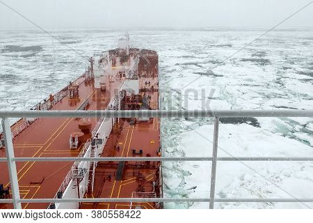 The Feed Of A Ship Sailing In The Arctic. Landscape Of The Arctic From The Deck Of The Tanker.