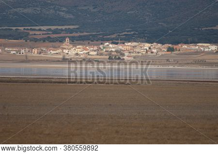 Gallocanta Lagoon Natural Reserve and Gallocanta village. Zaragoza. Aragon. Spain.