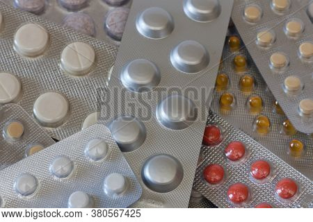 Medications. Meny Different Colourfull Pills In Strips. Medicine Pills. Medicine Background From Muc
