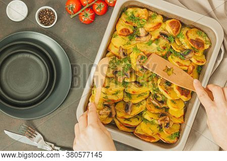 Potato Wedges Baked With Mushrooms, Herb Oven Roasted, With Thyme, A Close-up In A Baking Tray. Top 