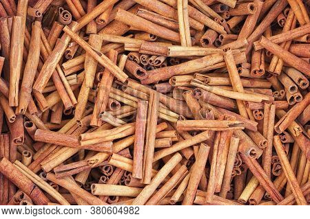 Cinnamon Stick Background. Group Of Cinnamon In Market. Top View. Carmella Stick Close Up.