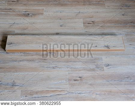 Laying Laminate Flooring In A Room At Home.