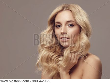 Portrait Of Beauty Caucasian Blond Woman Face Clean Skin Beautiful Female Eyes Lips With Perfect Hea