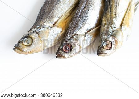Isolated Close Up Top View Three Dried Salted Chehon Fish On A White Background