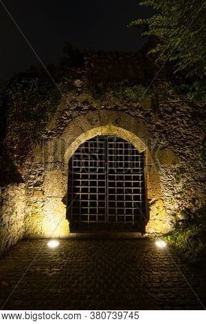 Kamnik, Slovenia - August 2, 2020: Steel Mesh Door Of The Castle Walls In Kamnik