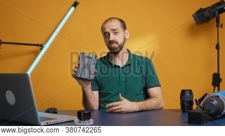 Content Creator Holding And Recording V Mount Battery Review For Vlog. Professional Acumulator. Mode