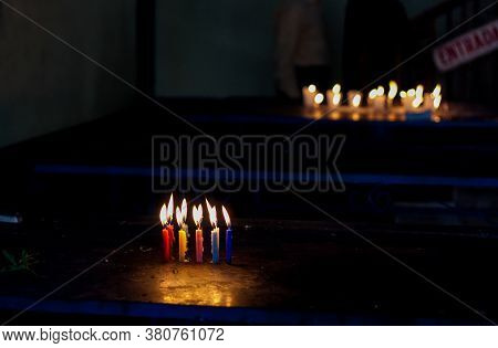 Candles Of Different Color On The Table As Offerings In Maximon San Simon Temple Near Antigua Guatem
