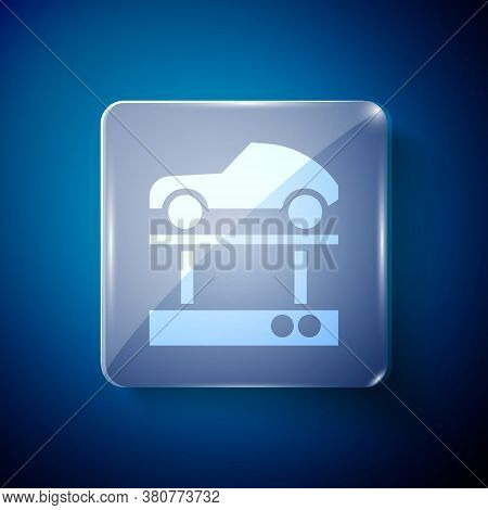 White Repair Car On A Lift Icon Isolated On Blue Background. Repair Of The Underbody, Suspension, Wh