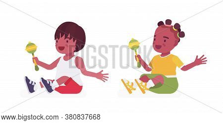 Toddler Children, Black Little Boy And Girl Enjoying Playing With Rattle Toy. Cute Sweet Happy Healt