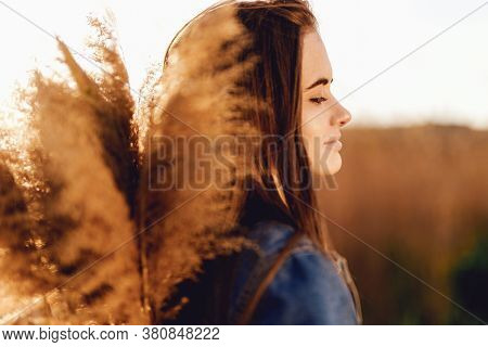Portrait Of Beautiful Natural Woman In The Park. Natural Lights.