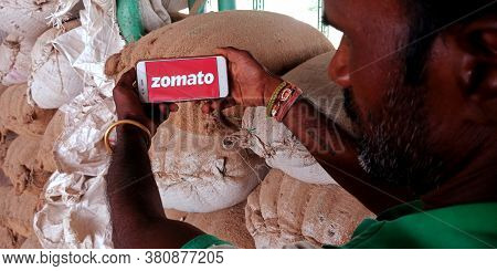 District Katni, India - September 20, 2019: Zomato Logo Presented On Smart Phone Screen By Indian Ma