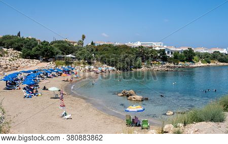 Protaras, Cyprus - August 6 2020: Idyllic Beach With Turquoise Water And Crowded With Tourists Swimm