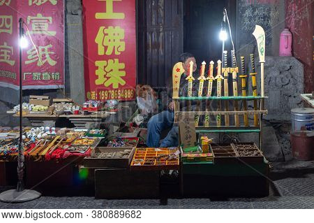 Luoyang, Henan Province / China - January 3, 2016: Man Selling Traditional Handicrafts In Luoyang Ol