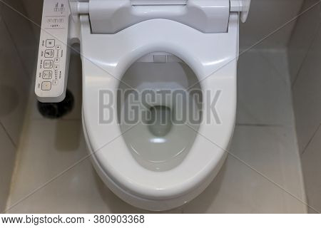 Electronic Control Panel Of Toilet Sanitary Ware With Automatic Flush System. Toilet With Electronic