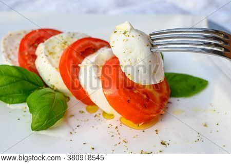 Fresh Caprese Salad Made With Soft White Italian Cheese Mozzarella Buffalo, Green Basil, Red Tomatoe