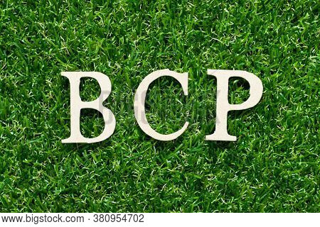 Wood Alphabet Letter In Word Bcp (abbreviation Business Continuity Plan) On Green Grass Background