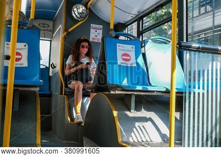 Belgrade / Serbia - August 8, 2020: Young Girl Wearing A Medical Face Mask On Belgrade City Public B